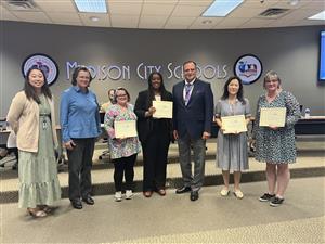 Four teachers honored with DIAL scholarships shown with Dr. Nichols and UAH, MCS admins